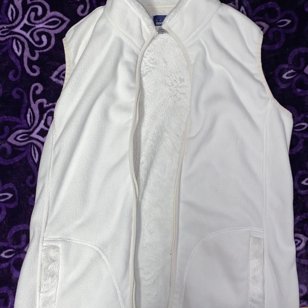 White vest.